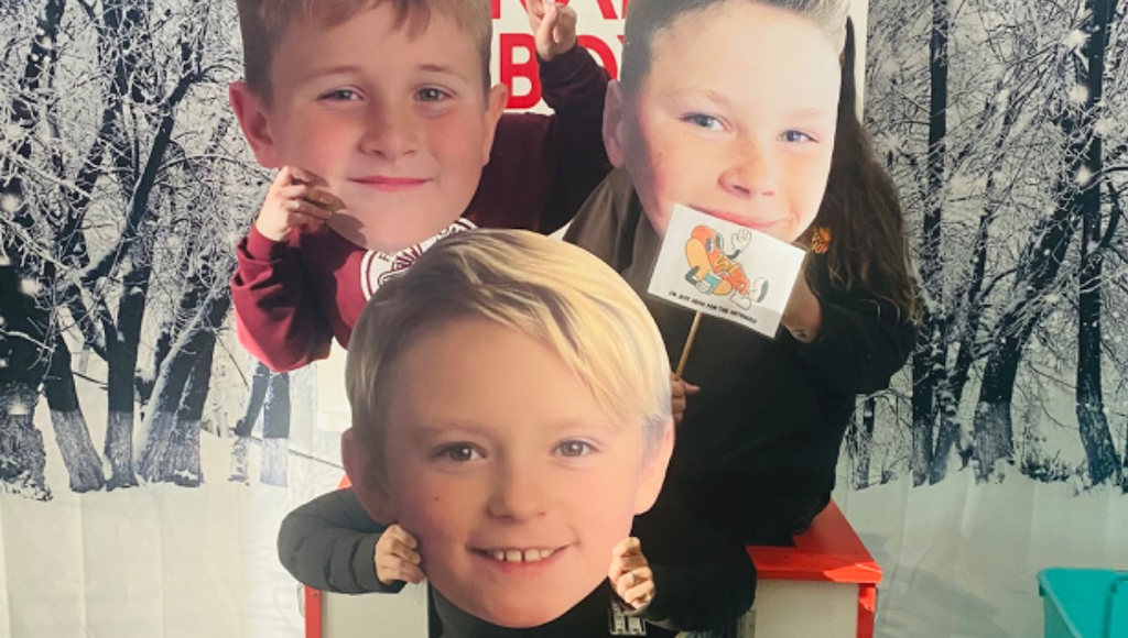 Big head cutouts of sports team players